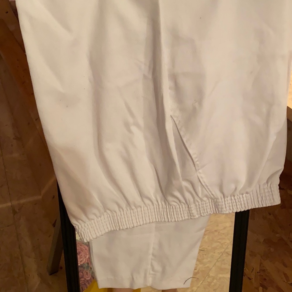 White tapered legged trousers